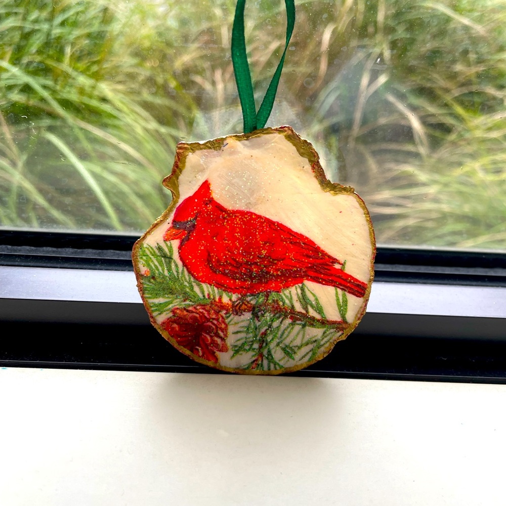 Cardinal ornaments decoupaged by hand